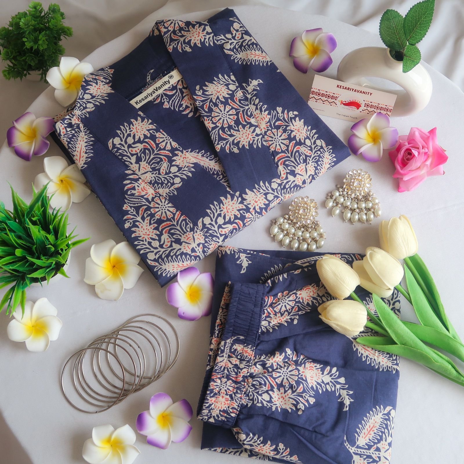 IMG-20240531-WA0038_86e04c16-1d5a-466c-9052-60313b5c15c8.jpg Navy Blossom V-Neck Suit Set - Image 1