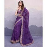 Purple Bandhani Printed Georgette Saree With Embroidered Lace Border - Image 4