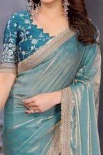 Teal Satin Saree with Solid Body and Decorative Lace Embellished Border – A Modern Ethnic Staple - Image 2