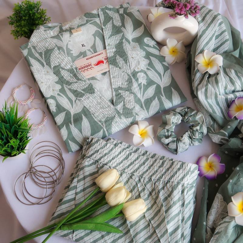IMG-20240518-WA0050_27eb9ab3-aa28-490e-a3ec-7a503c492aab.jpg Verdant Leaf Symphony Suit Set - Image 1